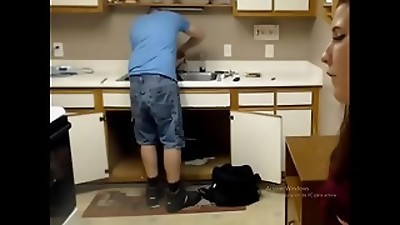 woman seducing plumber