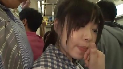 Japanese student gets her throbbing pussy fingered in a bus